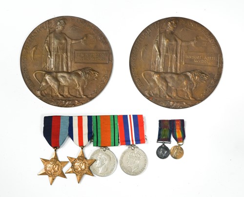 Lot 4 - Two WWI commemorative bronze plaques to...
