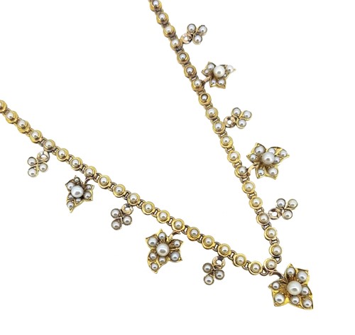 Lot 157 - An Edwardian split pearl necklace