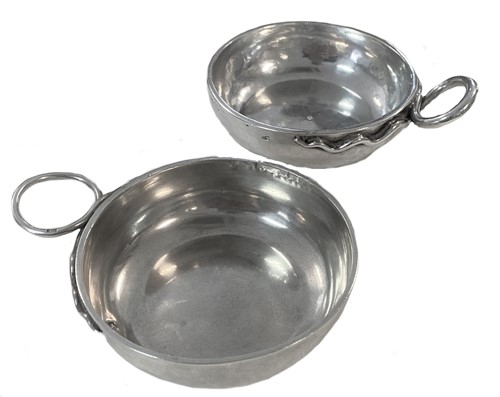 Lot 463 - A 19th century French metalwares silver tastevin together with a (probably) 18th century example