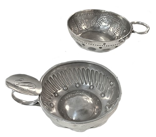 Lot 465 - Two (probably) 19th century French metalwares silver tastevins