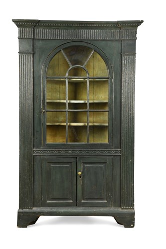 Lot 111 - A large green painted corner cabinet, 18th century