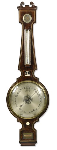 Lot 313 - An imposing Regency mahogany and brass strung wheel barometer