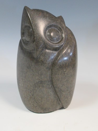 Lot 159 - Richard Mteki, a carved and signed stone owl,...