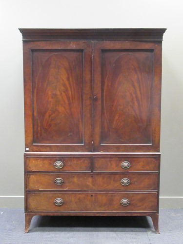 Lot 489 - A George III mahogany linen press, the pair of...