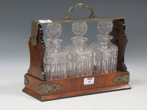 Lot 75 - An Edwardian Betjemann's patent Tantalus with...