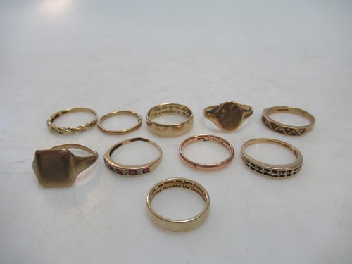 Lot 227 - Ten yellow metal rings, hallmarked or assessed...