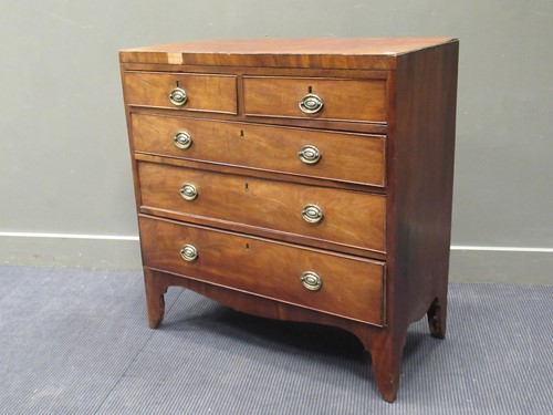 Lot 498 - A Regency chest of two short and three long...