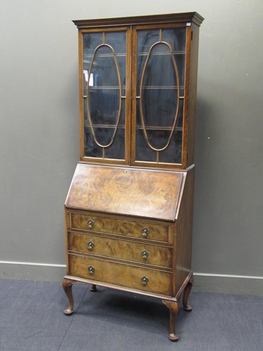 Lot 450 - A 1920s walnut bureau bookcase, 196 x 80 x 41cm
