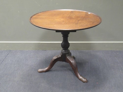 Lot 487 - A George III mahogany tilt top tripod table,...