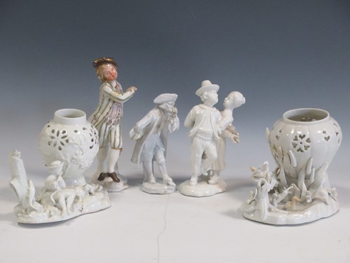 Lot 73 - Two similar white glazed figural vases, 12cm...