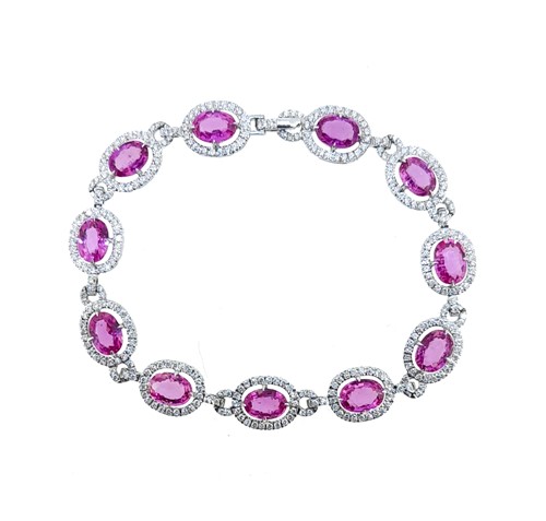 Lot 267 - A pink sapphire and diamond bracelet