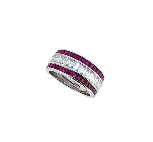 Lot 118 - A ruby and diamond half hoop style ring