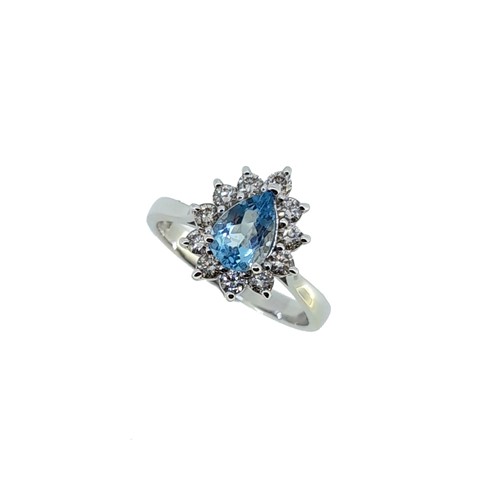 Lot 260 - A pear shaped aquamarine and diamond cluster ring
