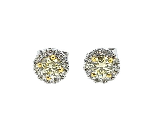 Lot 219 - A pair of fancy yellow diamond halo style ear studs