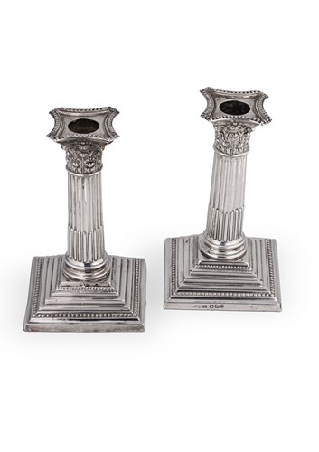 Lot 582 - A pair of Victorian silver library candlesticks