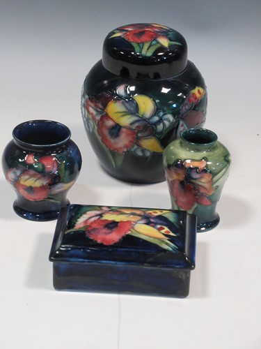 Lot 14 - A Moorcroft Orchid pattern ginger jar and...