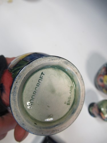 Lot 14 - A Moorcroft Orchid pattern ginger jar and...