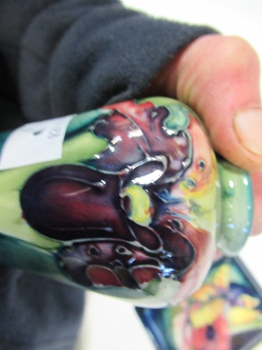 Lot 14 - A Moorcroft Orchid pattern ginger jar and...