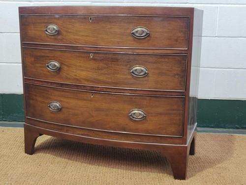 Lot 546 - A late 19th century mahogany bow front chest...