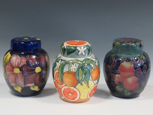 Lot 33 - Three large Moorcroft ginger jars and covers:...