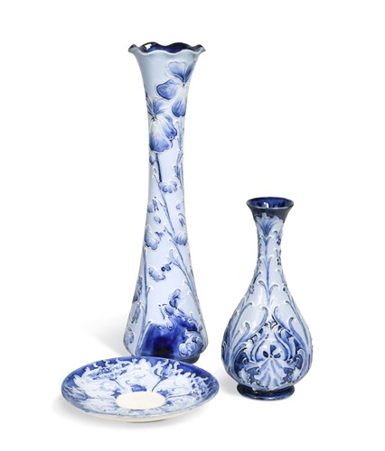 Lot 55 - Two Macintyre Moorcroft Florian ware vases, together with a Florian ware saucer