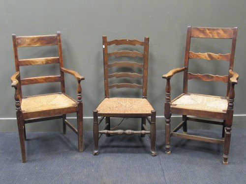 Lot 456 - A 19th century rush seated ladder back chair...