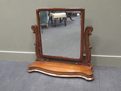 Lot 474 - A Victorian mahogany swing mirror, the...