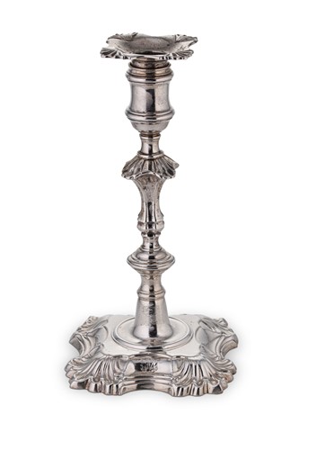 Lot 529 - A George II cast silver candlestick, mark of John Cafe
