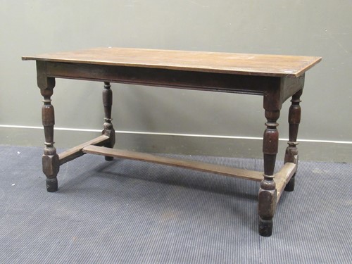 Lot 458 - An 18th century oak refectory table, the four...