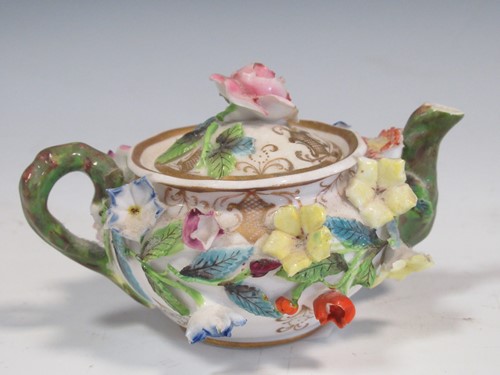 Lot 81 - A Spode miniature teapot and cover, floral...