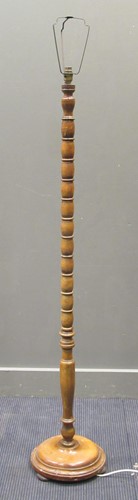 Lot 472 - A 20th century walnut bobbin turned standard...