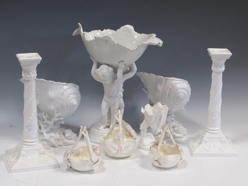 Lot 66 - Two Naples Ginori white shell vases on coral...