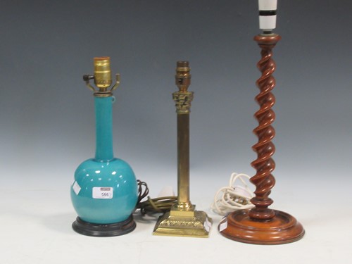 Lot 586 - A collection of three lamps: A blue glaze lamp...