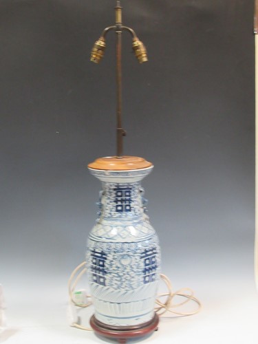 Lot 579 - A Chinese Republic period blue and white vase...