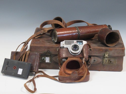 Lot 85 - A leather bound telescope, stamped 'T.T & H...