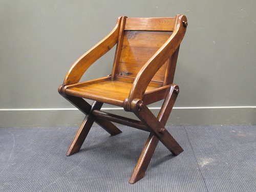 Lot 467 - A 19th century oak Glastonbury chair, 82 x 64...