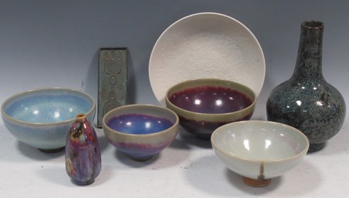 Lot 16 - Four Chinese 'Jun' bowls, a white 'Ding' style...