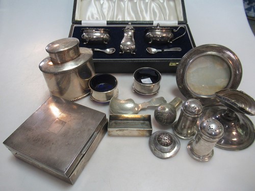 Lot 263 - A collection of silverware including cruets,...