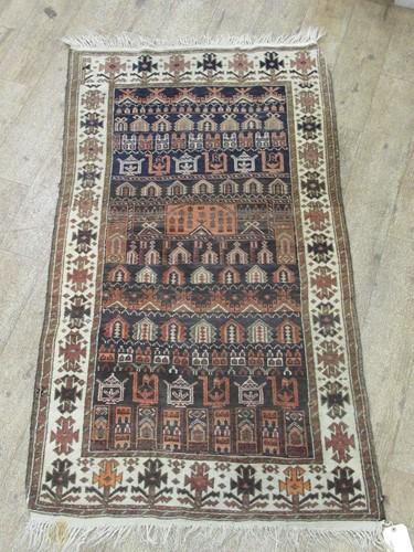 Lot 599 - A vintage Beluchi rug, 164 x 89cm
