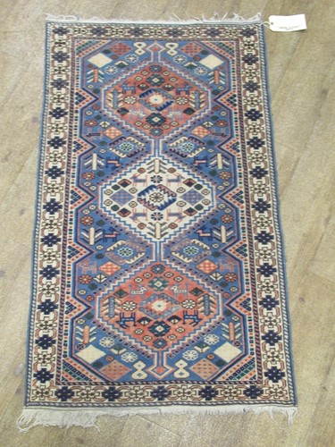 Lot 601 - Four vintage rugs, 125 x 73cm, 93 x 63cm, 88 x...