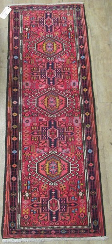 Lot 600 - A vintage Heriz runner, 190 x 67cm
