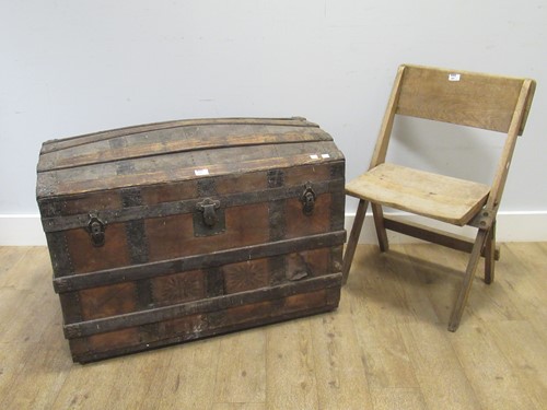 Lot 581 - A vintage dome topped trunk 68 x 92 x 51cm and...
