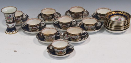 Lot 82 - A blue and gilt tea service decoarted with birds