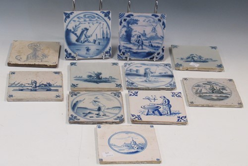 Lot 39 - A set of eleven delft tiles decorated with...