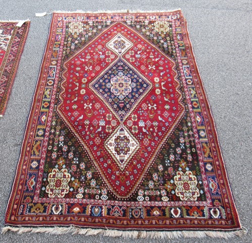 Lot 610 - An intricate Qashqai carpet, 267 x 148cm