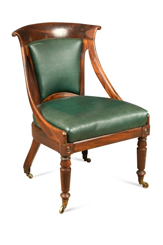 Lot 204 - A goncalo alves library armchair, 19th century