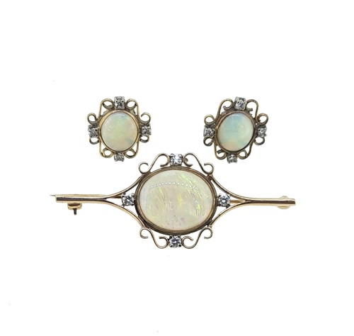 Lot 122 - An opal and diamond brooch, together with matching ear studs