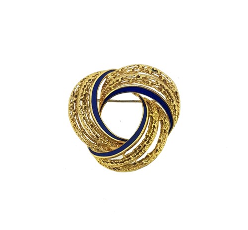 Lot 35 - An enamel swirl brooch