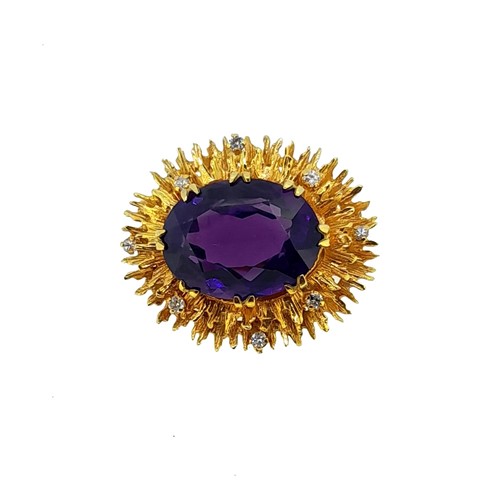 Lot 106 - A late 20th century amethyst and diamond brooch