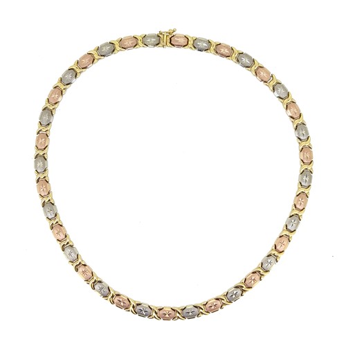 Lot 195 - A three colour collarette